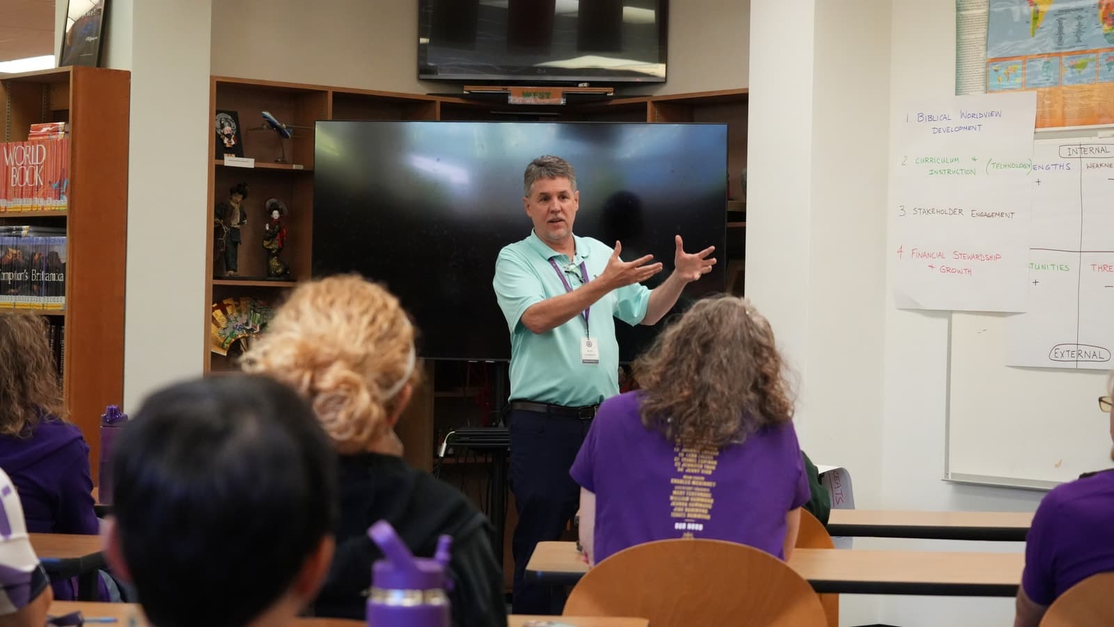 RenewaNation coach leading a strategic planning session with school staff